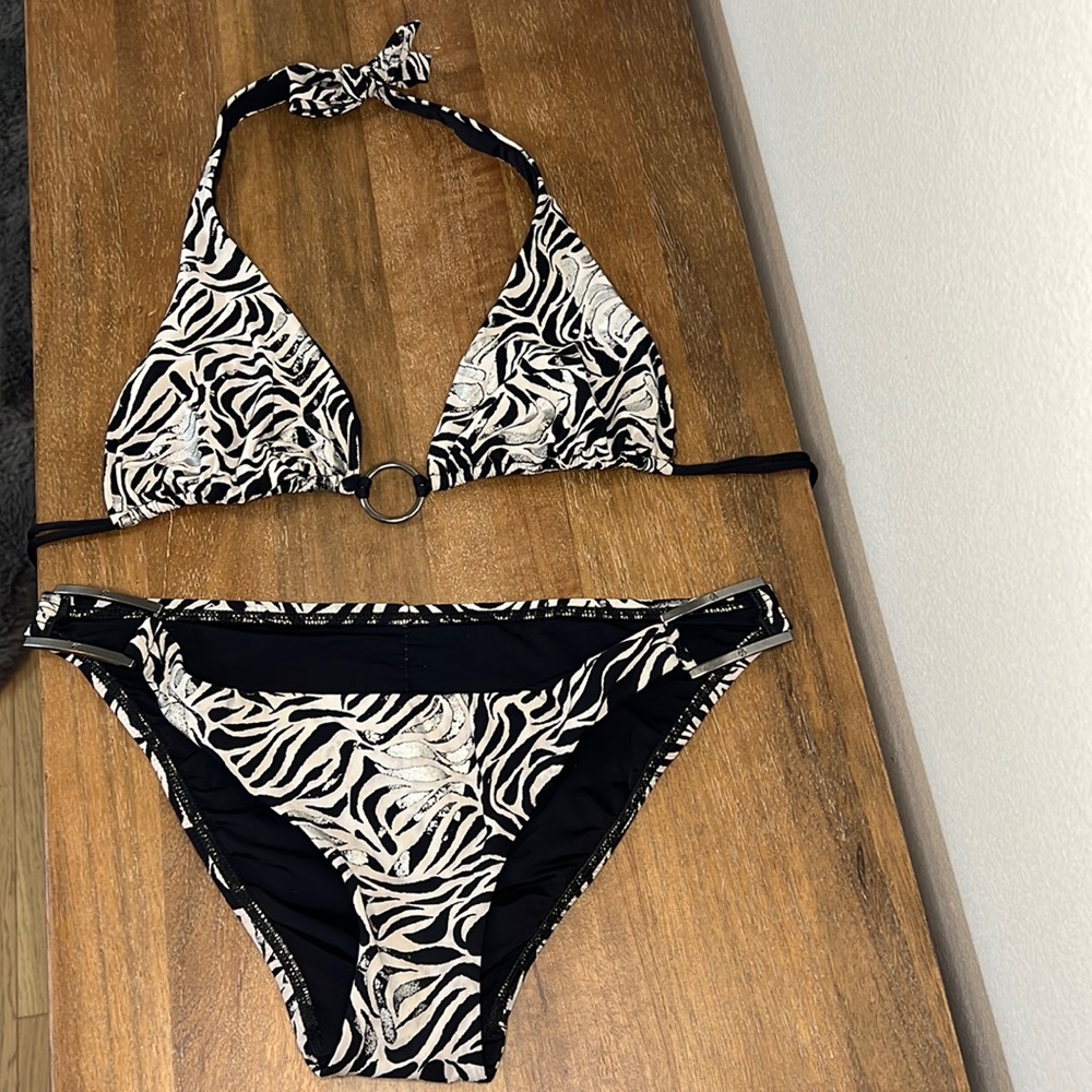 Vitamin a bikini. As is. Gently used. Adjustable top. Zebra stripe with silver